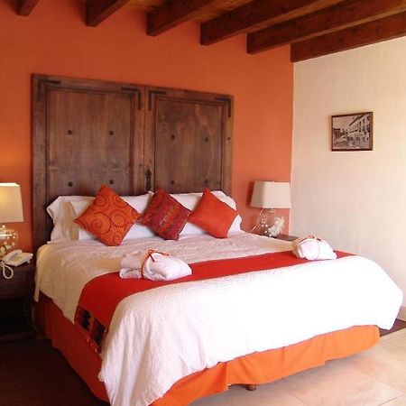 Casa Del Tio Hotel Boutique San Miguel de Allende Kamer foto A bedroom at Hotel San Cristóbal