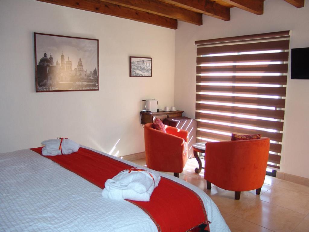 Casa Del Tio Hotel Boutique San Miguel de Allende Kamer foto A room at the hotel
