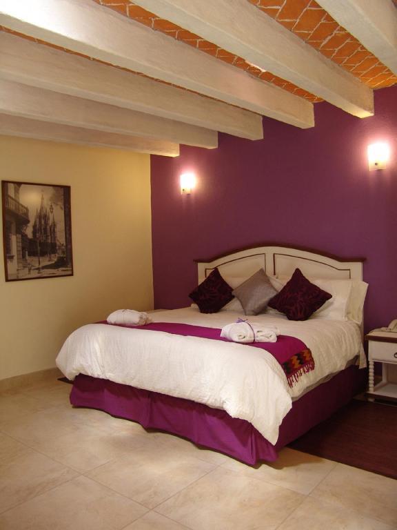 Casa Del Tio Hotel Boutique San Miguel de Allende Kamer foto A bedroom at the hotel