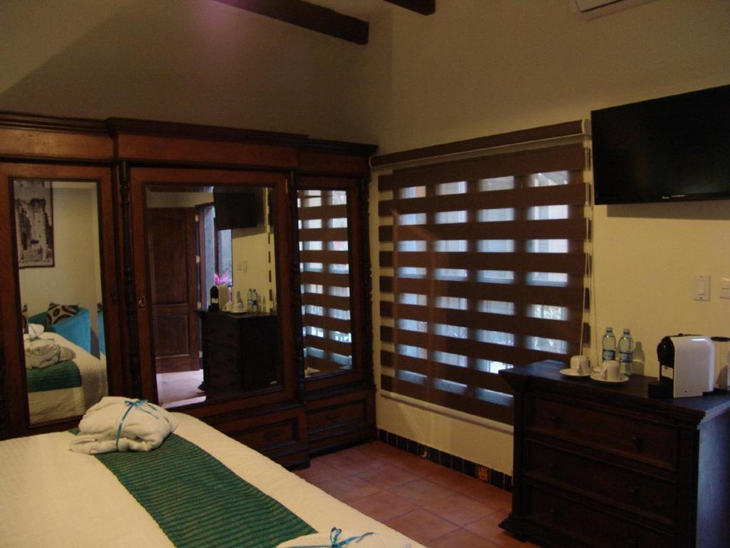 Casa Del Tio Hotel Boutique San Miguel de Allende Kamer foto A room at the resort