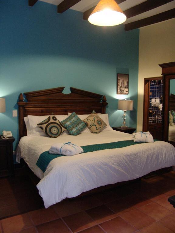 Casa Del Tio Hotel Boutique San Miguel de Allende Kamer foto A bedroom at Hotel San Angel Inn